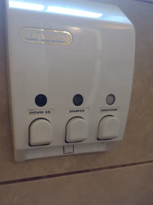 eco-friendly practices - shower soap dispenser